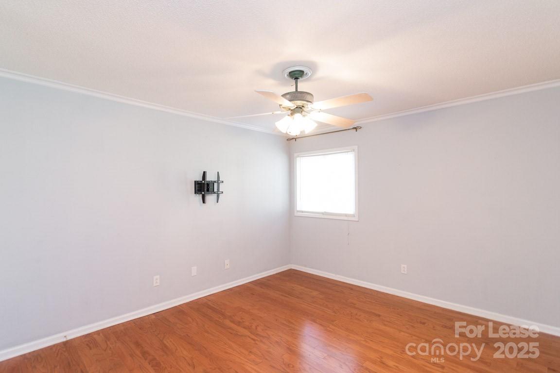 140 Lake Concord Road Northeast, Unit B4 Concord, NC 28025 - Photo 12 of 23 an empty room with a window