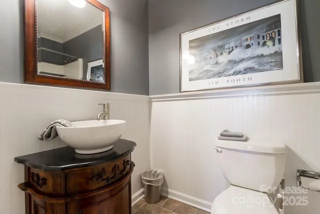 a bathroom with a toilet and a sink