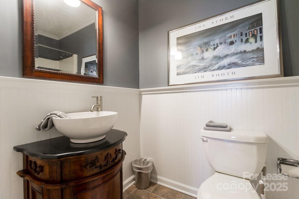 140 Lake Concord Road Northeast, Unit B4 Concord, NC 28025 - Photo 20 of 23 a bathroom with a toilet and a sink