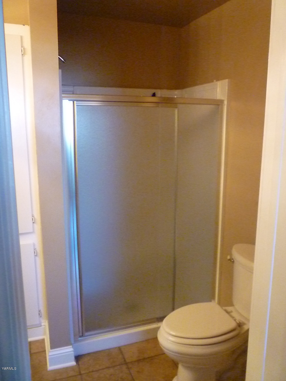 3020 Fort Road Toppenish, WA 98948 - Photo 36 of 37 a white toilet sitting next to a shower