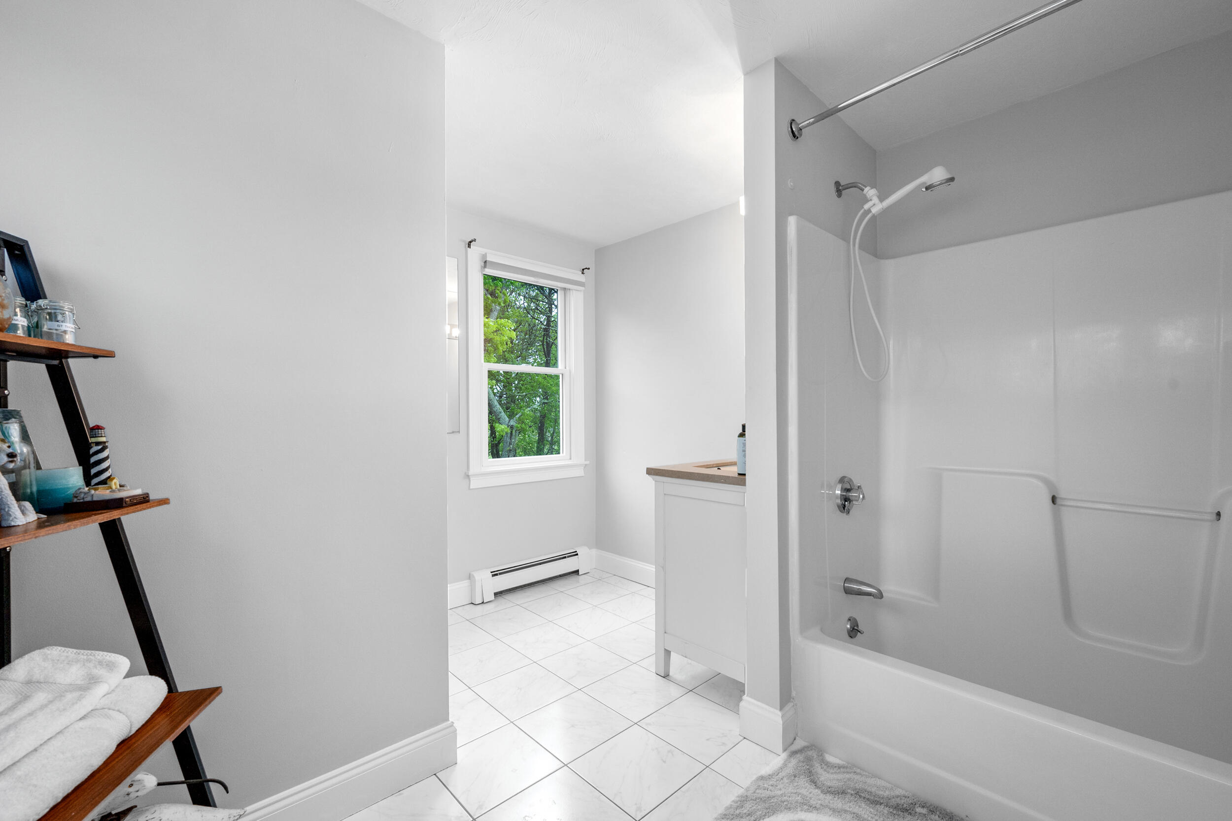 35 Bayshore Drive Mashpee, MA 02649 - Photo 24 of 55 a bathroom with a glass shower door