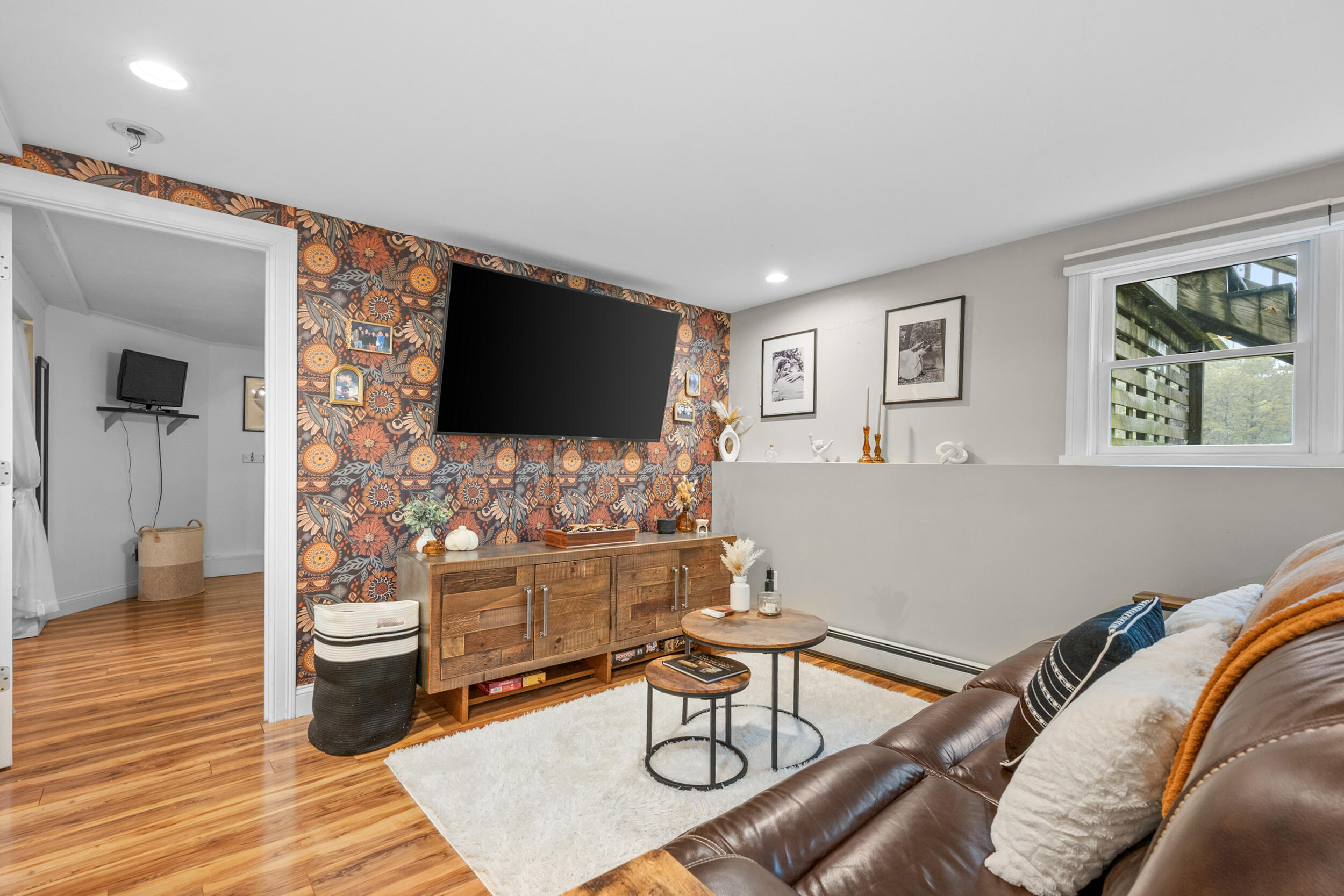 35 Bayshore Drive Mashpee, MA 02649 - Photo 31 of 55 a living room with furniture and a flat screen tv