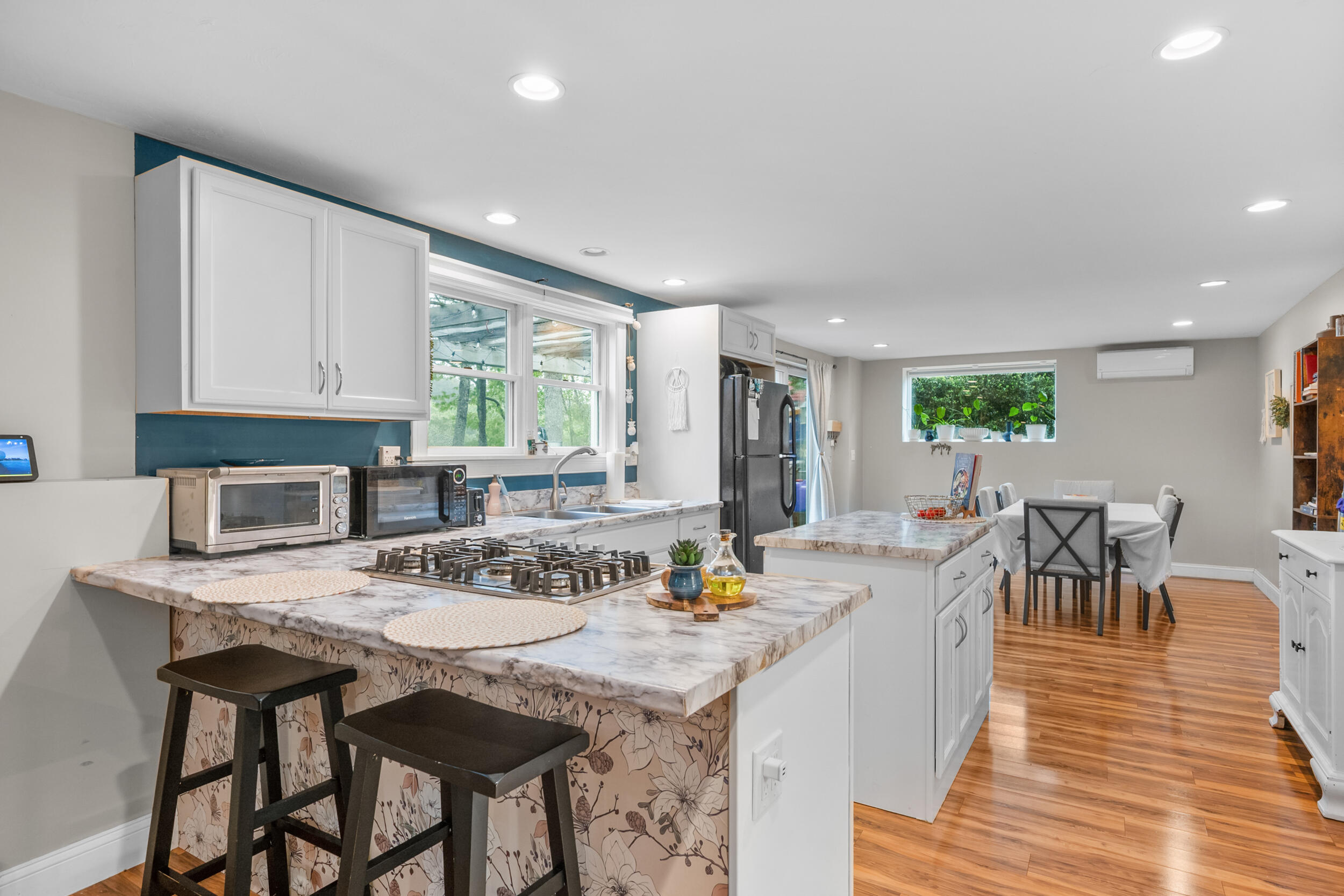 35 Bayshore Drive Mashpee, MA 02649 - Photo 34 of 55 a view of a dining room with furniture and wooden floor