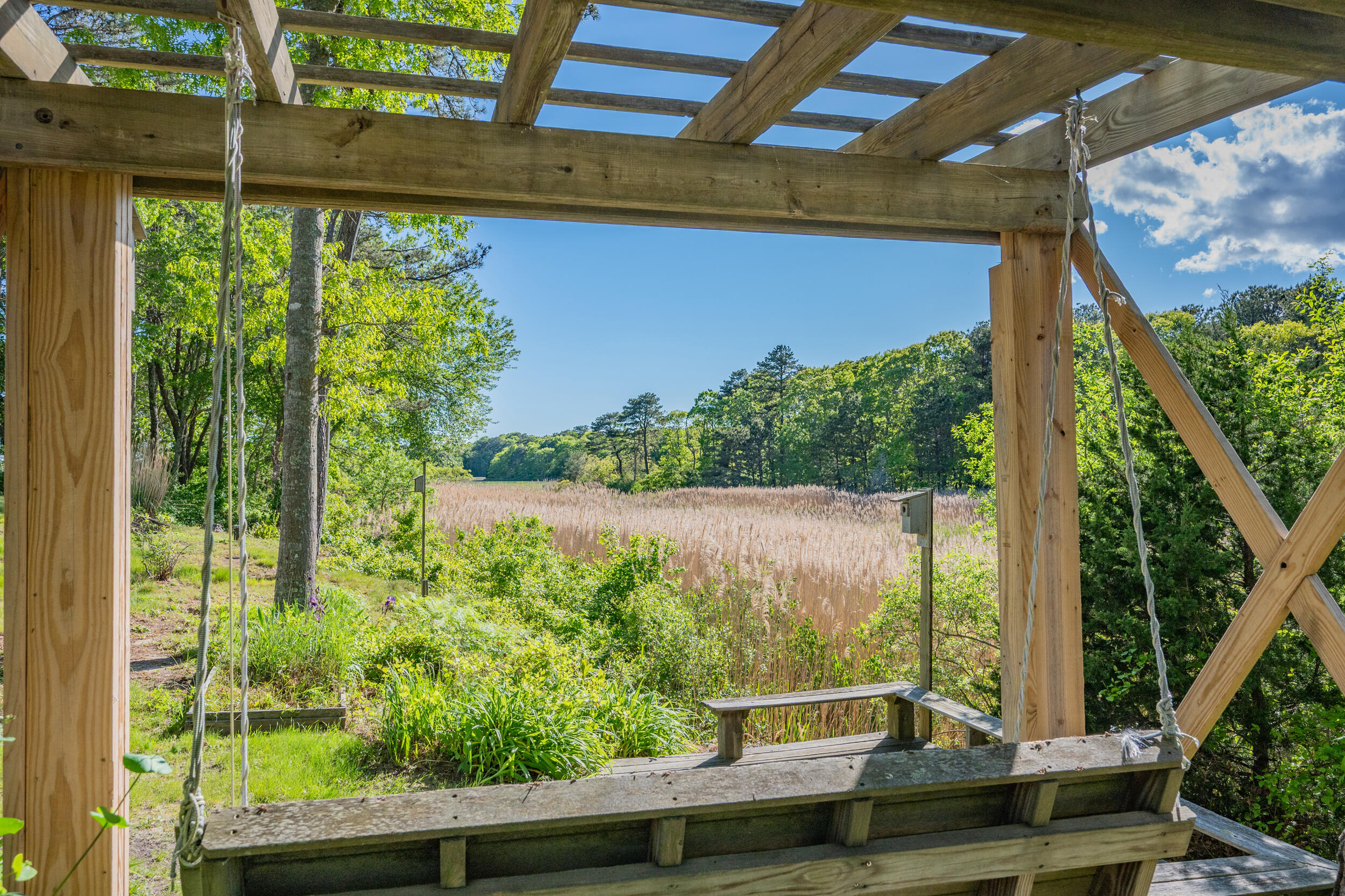 35 Bayshore Drive Mashpee, MA 02649 - Photo 45 of 55 a view of a back yard from a balcony