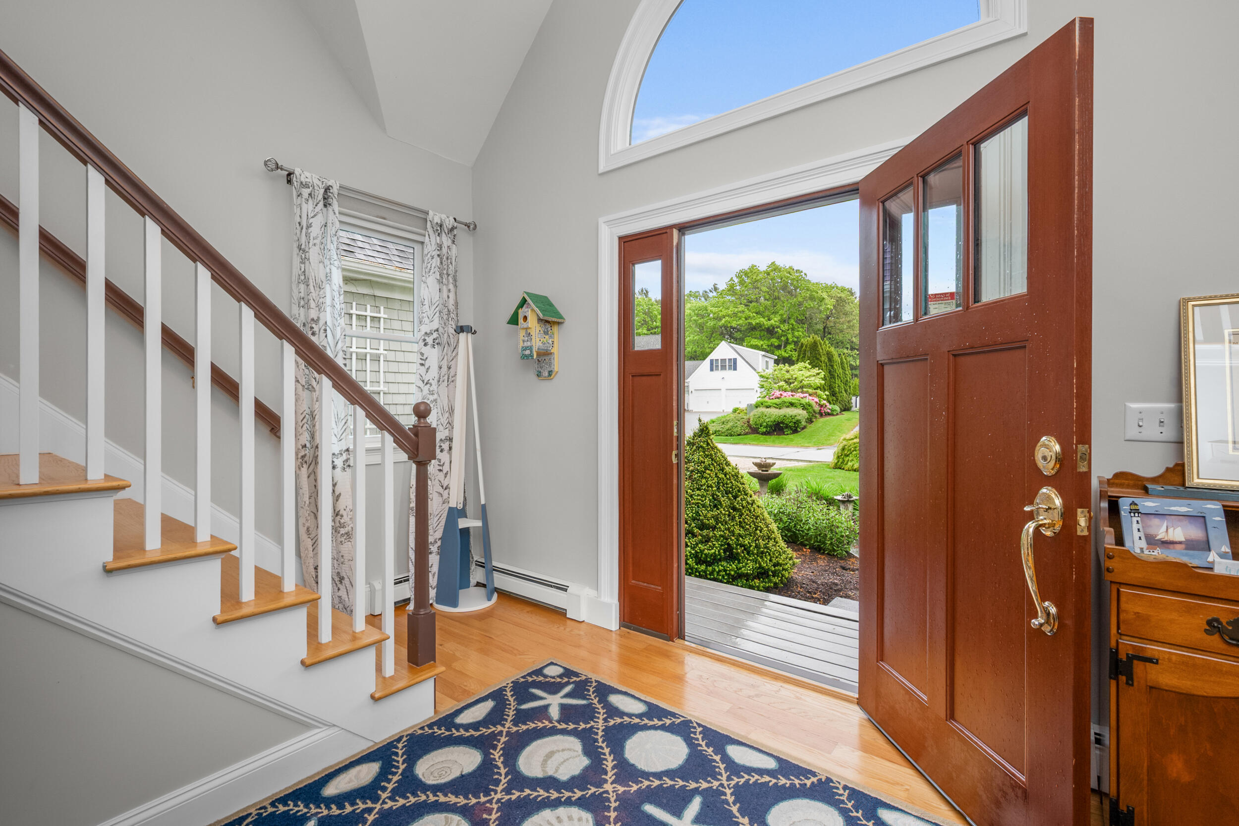35 Bayshore Drive Mashpee, MA 02649 - Photo 8 of 55 a view of an entryway with wooden floor and windows