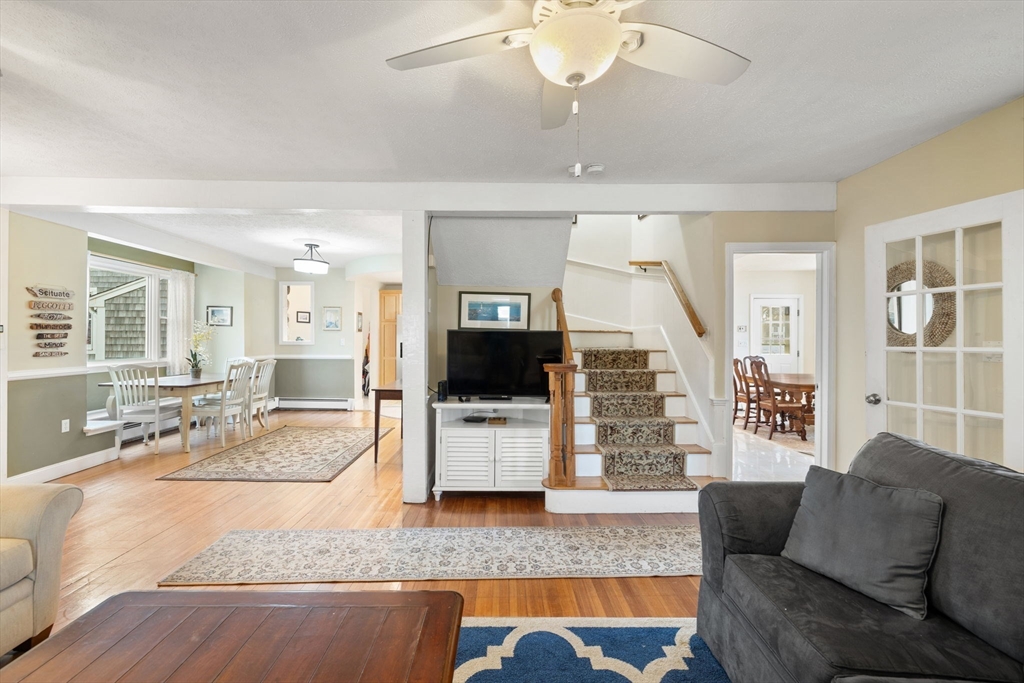 23 Oceanside Drive Scituate, MA 02066 - Photo 13 of 39 a living room with furniture and wooden floor