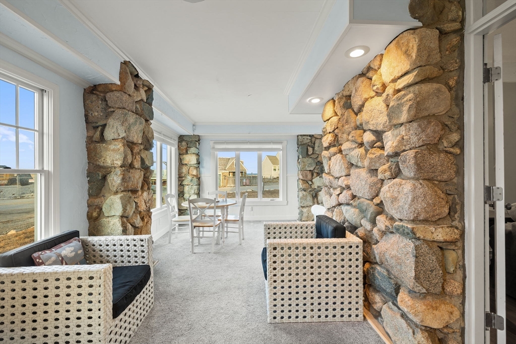 23 Oceanside Drive Scituate, MA 02066 - Photo 15 of 39 a living room with furniture and a window