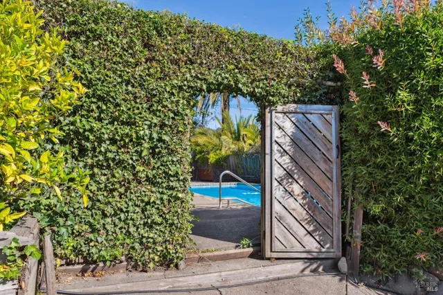 a backyard of a house with lots of green space