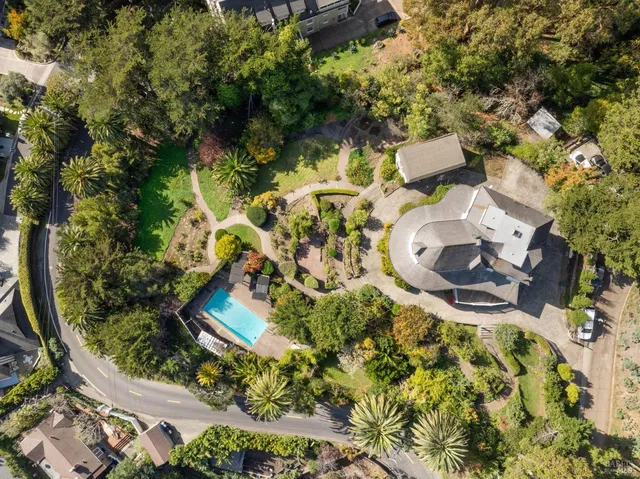 a view of a garden from a balcony