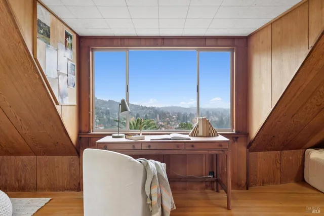 a room with furniture and a window