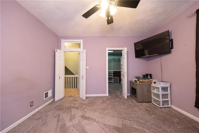 a view of a livingroom with furniture