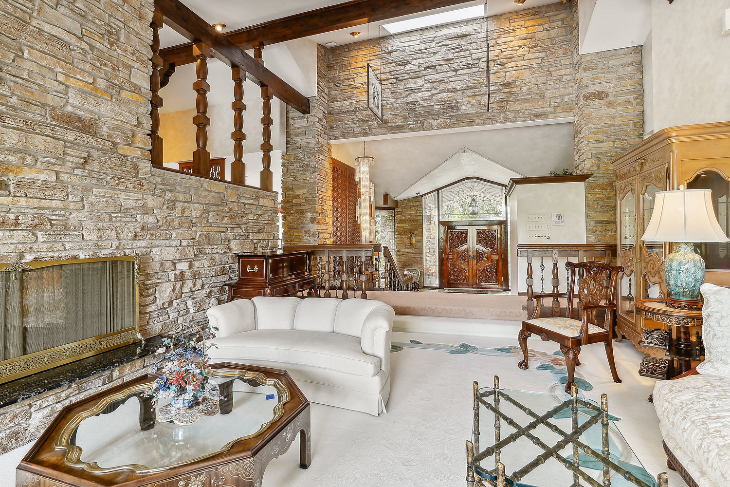 60 Baybrook Lane Oak Brook, IL 60523 - Photo 17 of 50 a living room with furniture and a fireplace