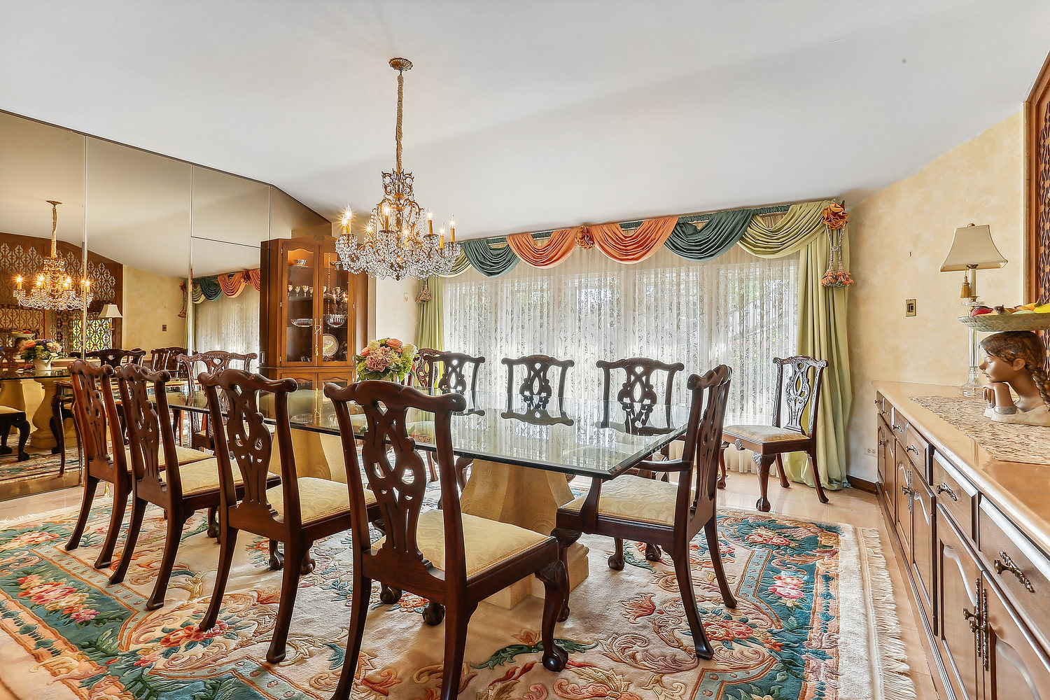 60 Baybrook Lane Oak Brook, IL 60523 - Photo 25 of 50 a view of a dining room with furniture and chandelier