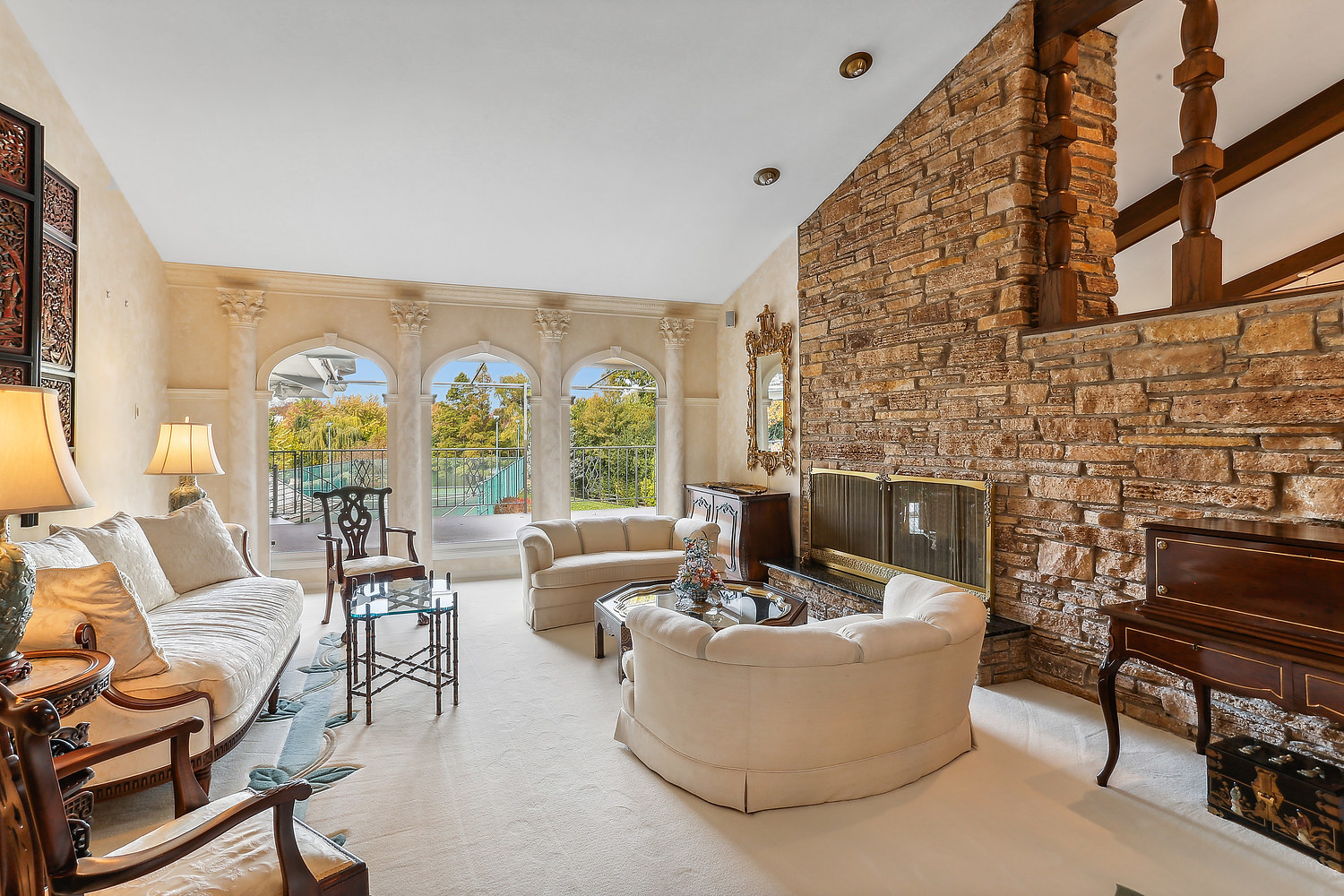 60 Baybrook Lane Oak Brook, IL 60523 - Photo 31 of 50 a living room with fireplace furniture and a large window
