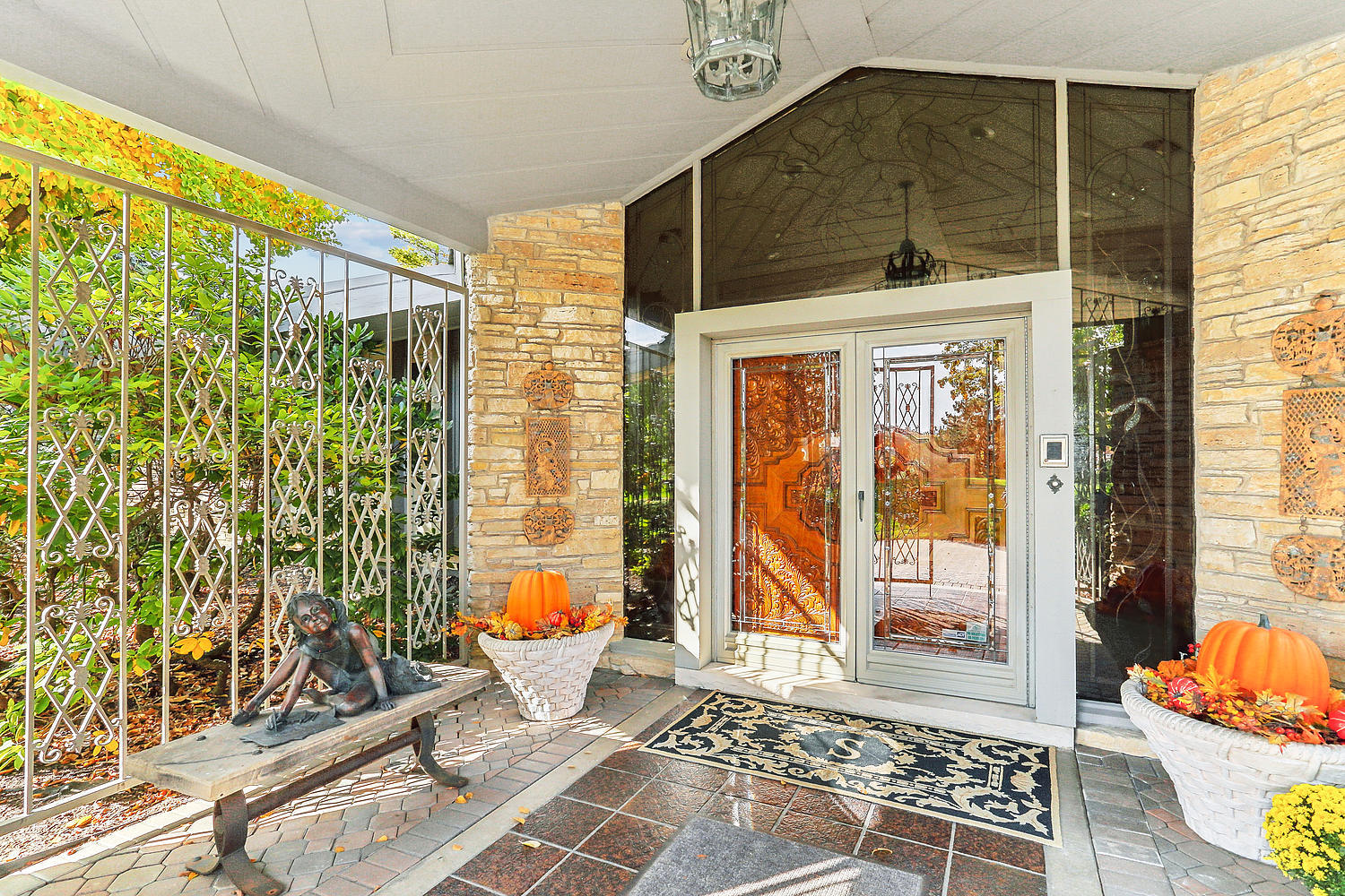 60 Baybrook Lane Oak Brook, IL 60523 - Photo 4 of 50 a view of a porch with a dining table and chairs