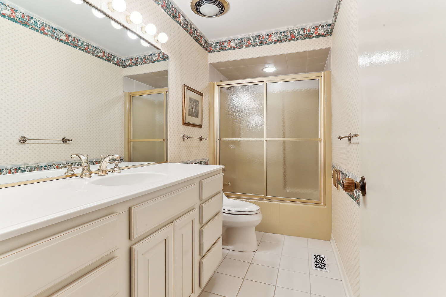 60 Baybrook Lane Oak Brook, IL 60523 - Photo 41 of 50 a bathroom with a sink a toilet and shower