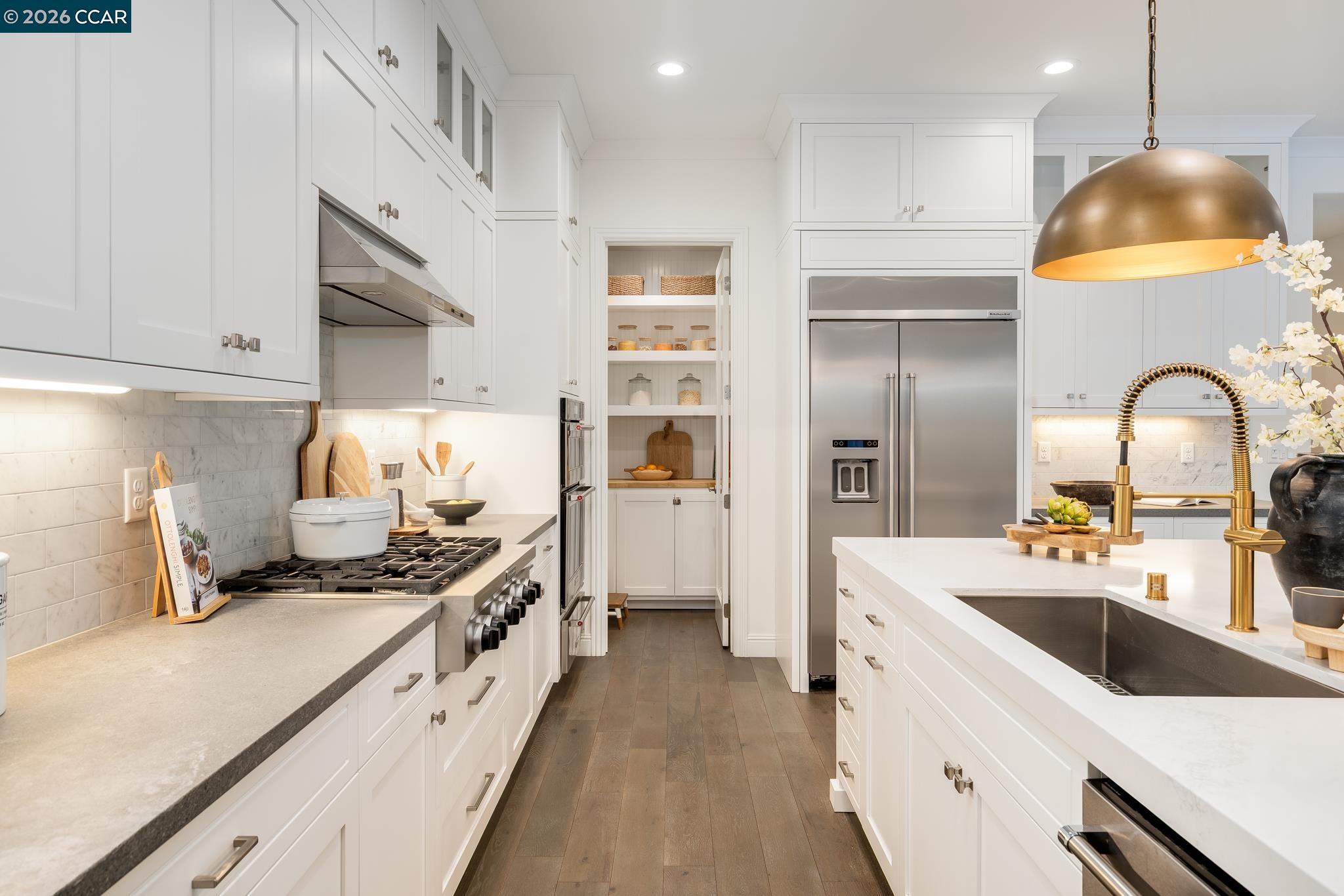 1150 Trumpet Vine Lane San Ramon, CA 94582 - Photo 12 of 45 a kitchen with a sink stove and refrigerator