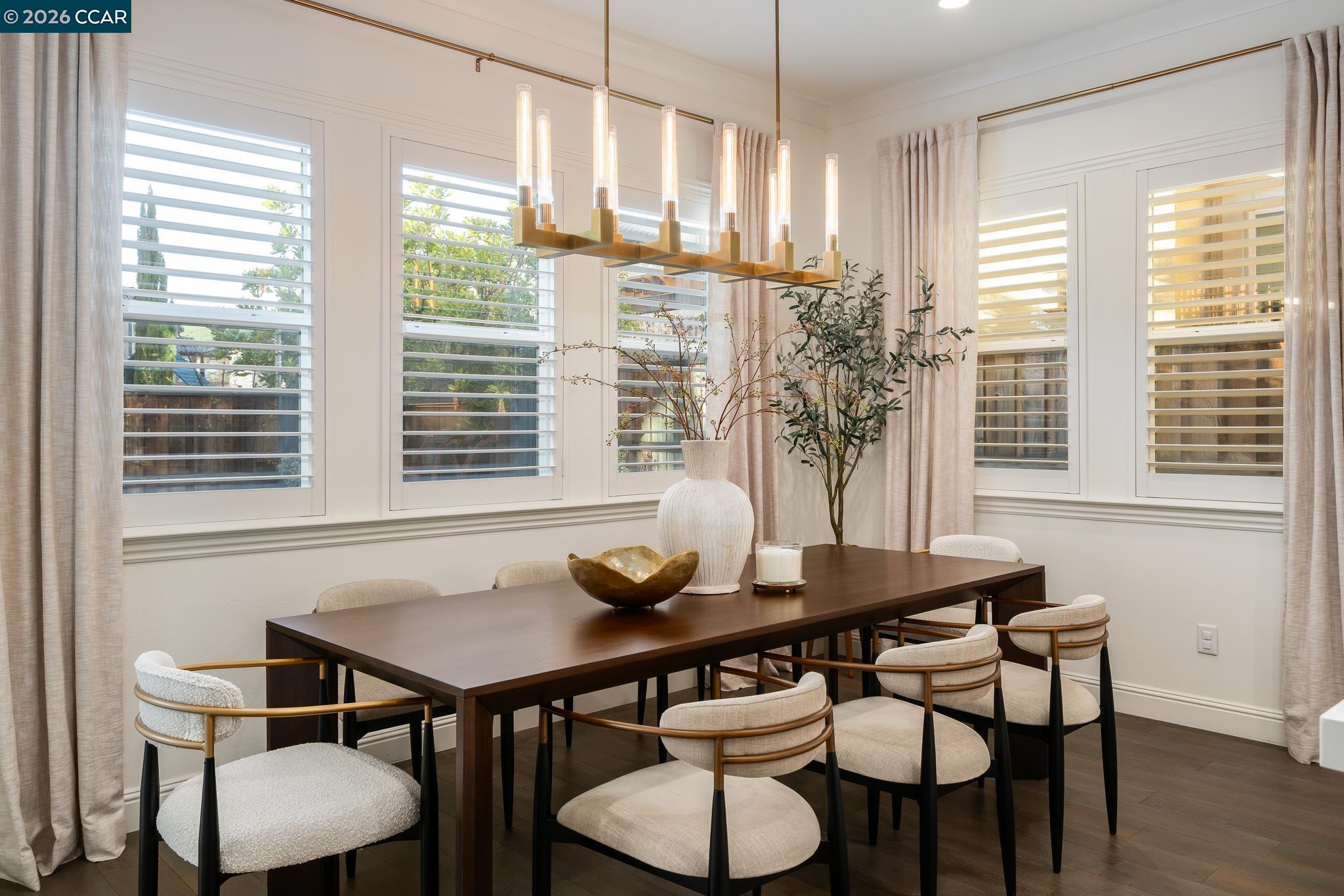 1150 Trumpet Vine Lane San Ramon, CA 94582 - Photo 16 of 45 a view of a dining room with furniture and wooden floor
