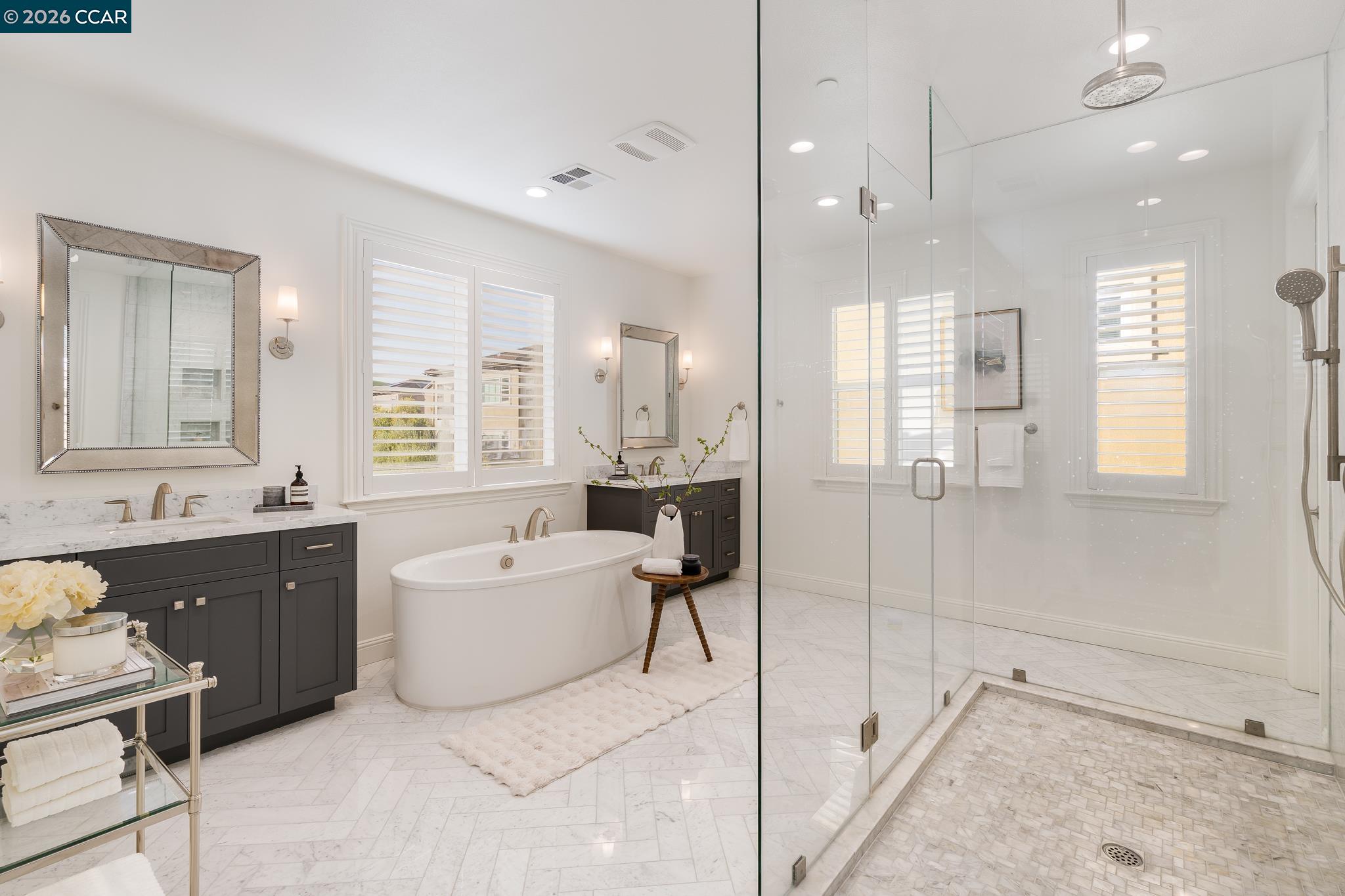 1150 Trumpet Vine Lane San Ramon, CA 94582 - Photo 23 of 45 a spacious bathroom with a bathtub shower sink and mirror