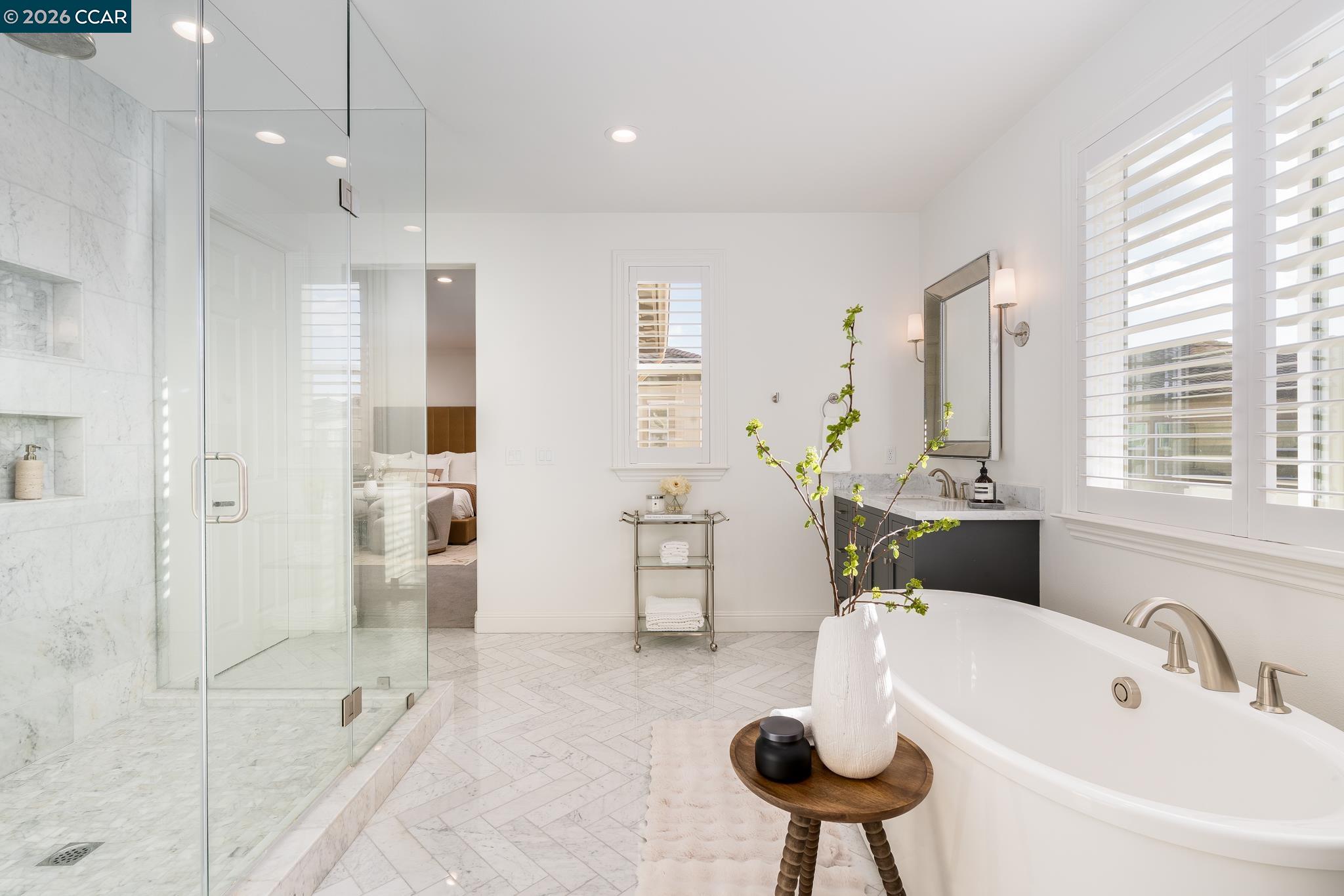 1150 Trumpet Vine Lane San Ramon, CA 94582 - Photo 25 of 45 a bathroom with a tub sink and toilet
