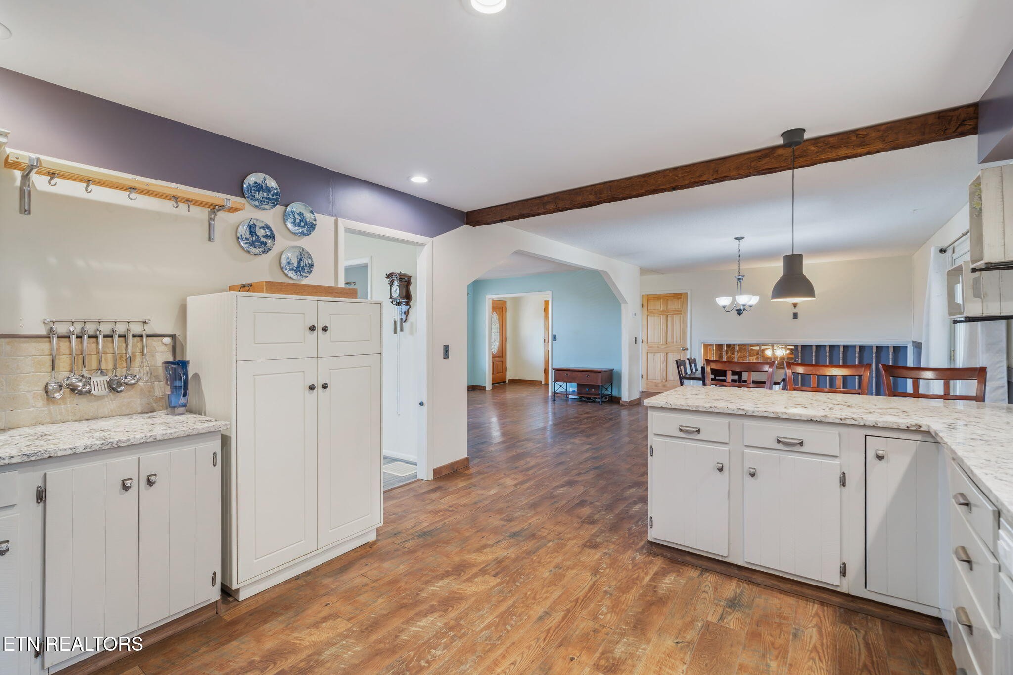 744 Butler Drive Loudon, TN 37774 - Photo 17 of 59 a large kitchen with a lot of counter space and wooden floor