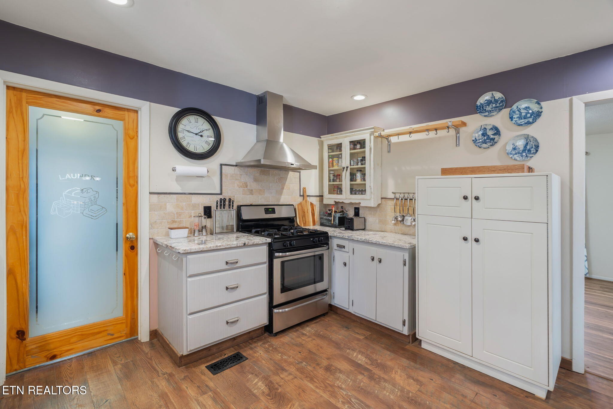 744 Butler Drive Loudon, TN 37774 - Photo 18 of 59 a kitchen with a stove oven and a refrigerator