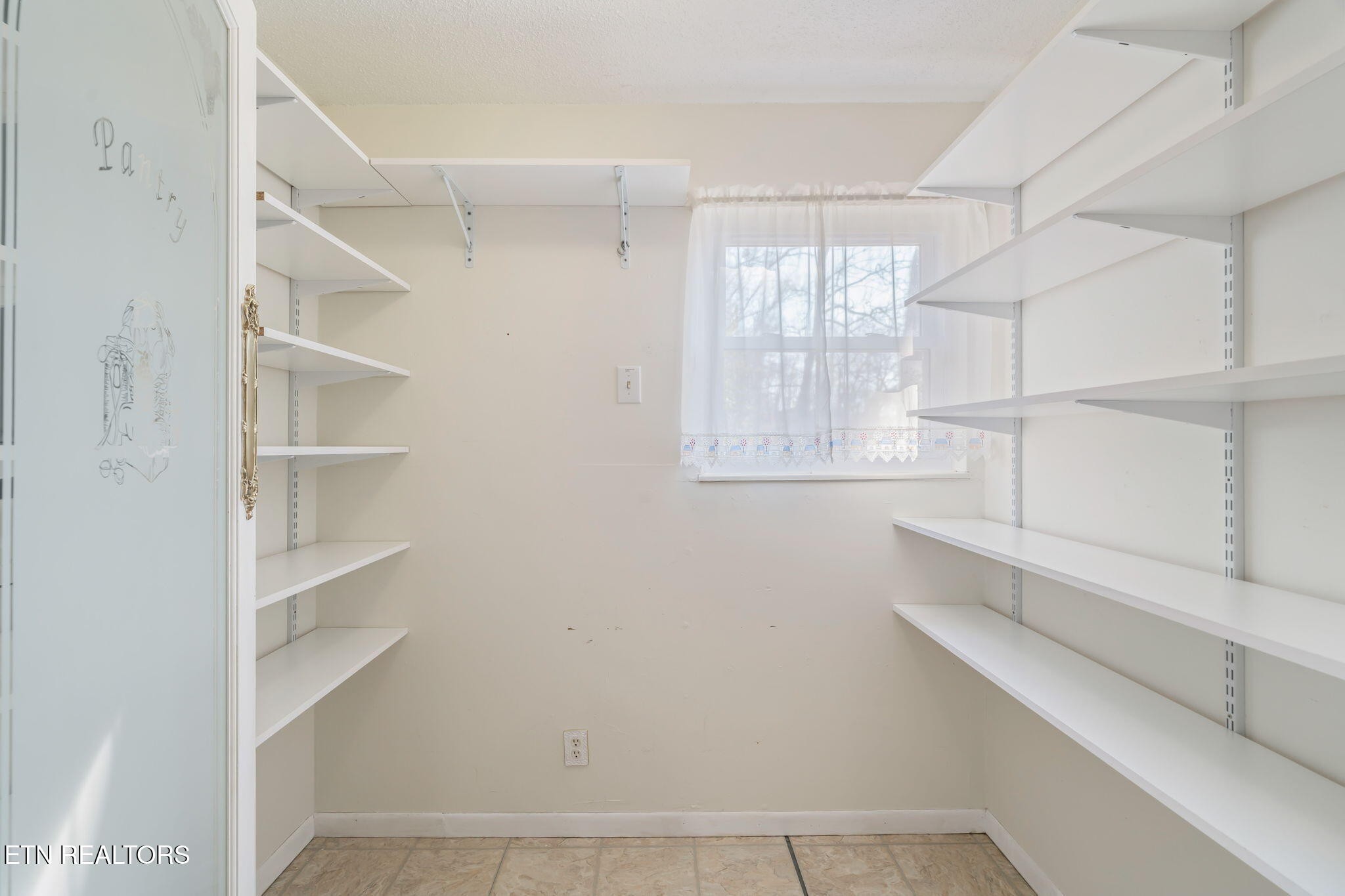 744 Butler Drive Loudon, TN 37774 - Photo 20 of 59 a view of walk in closet with empty racks