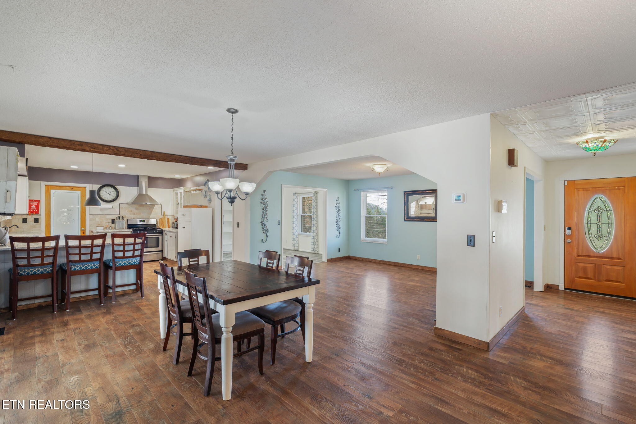 744 Butler Drive Loudon, TN 37774 - Photo 21 of 59 a view of a dining room with furniture and wooden floor