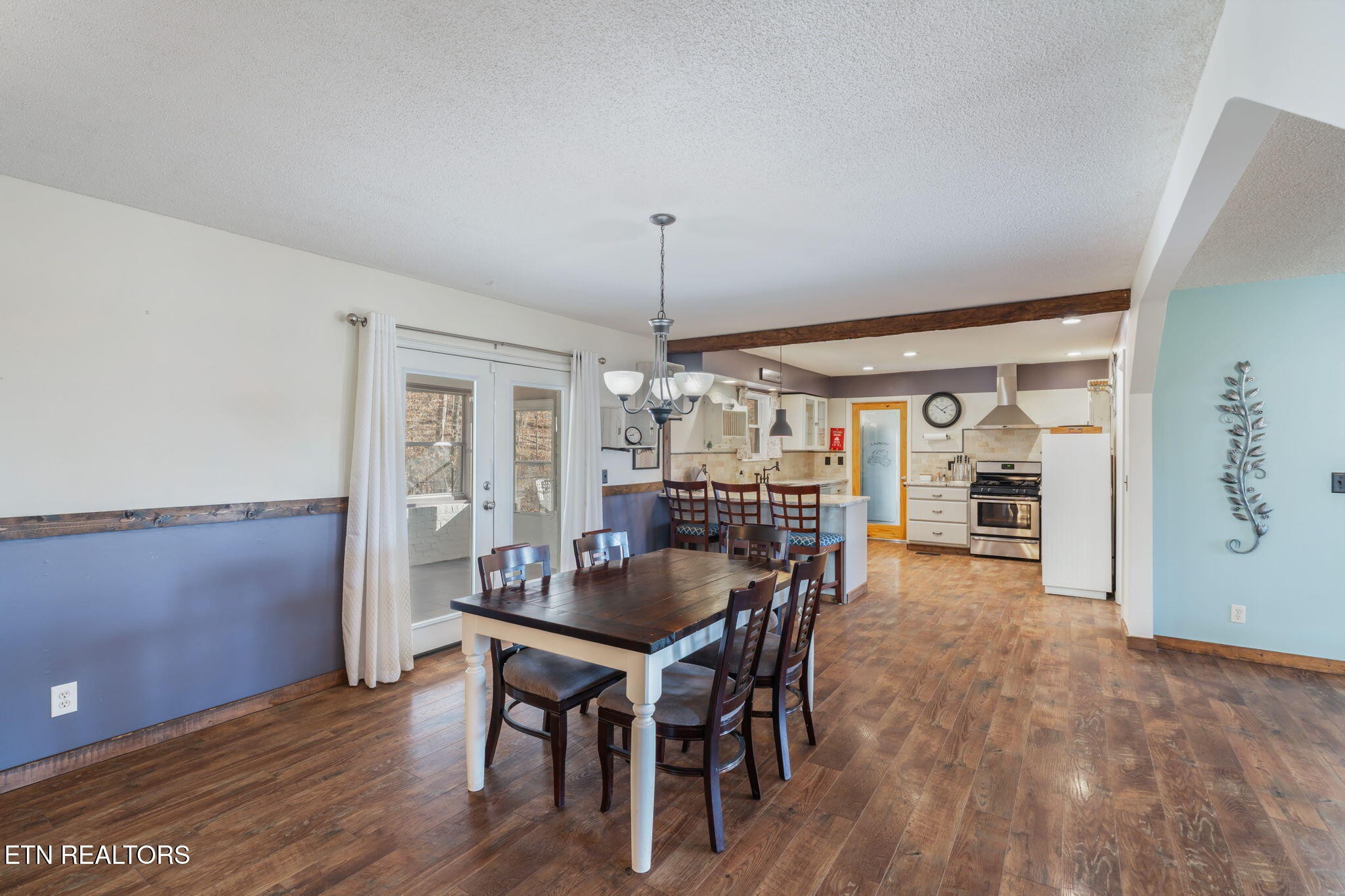 744 Butler Drive Loudon, TN 37774 - Photo 22 of 59 a view of a dining room with furniture and window