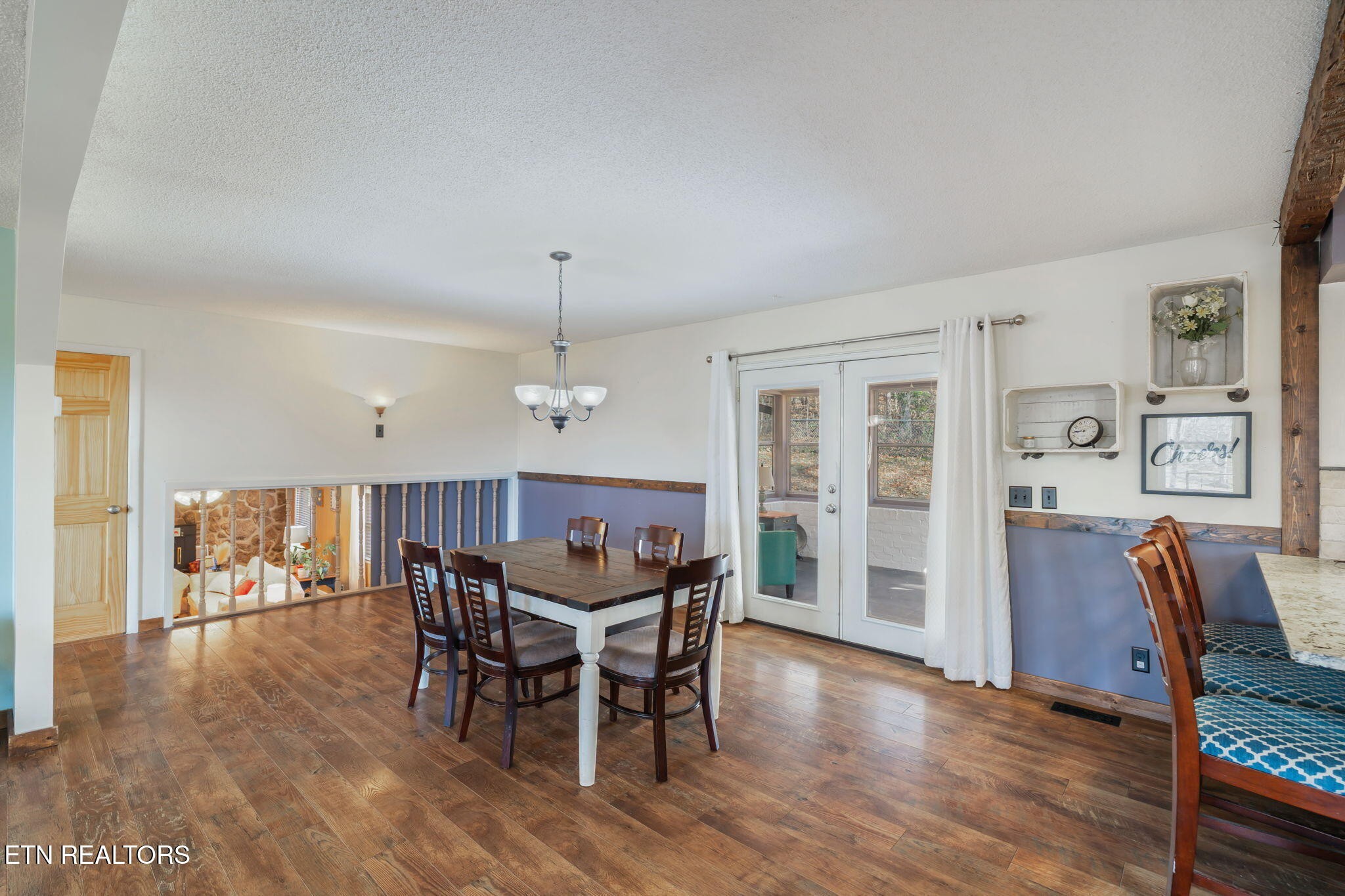 744 Butler Drive Loudon, TN 37774 - Photo 23 of 59 a view of a dining room with furniture and wooden floor