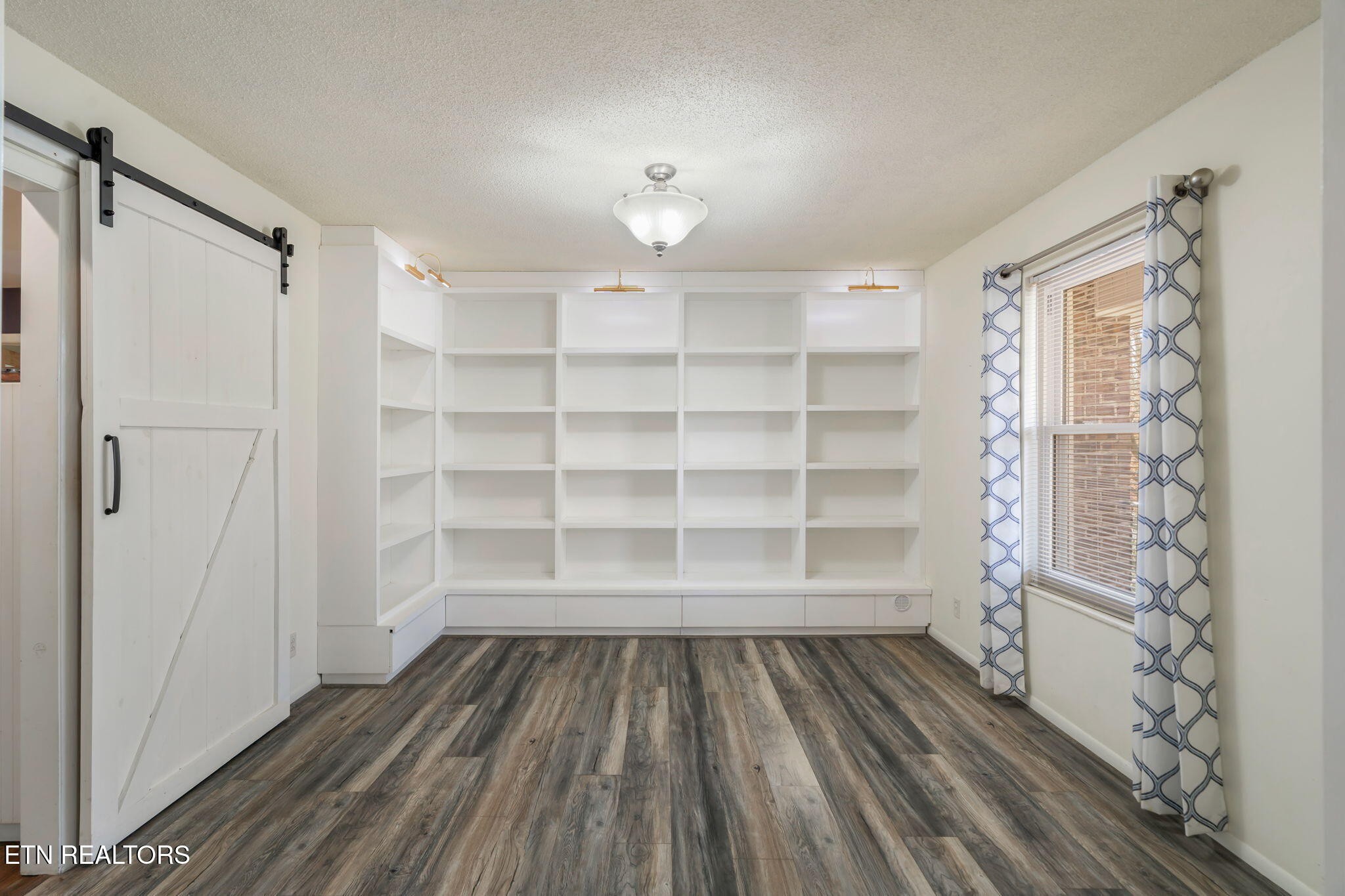 744 Butler Drive Loudon, TN 37774 - Photo 24 of 59 a view of wooden floor in a room