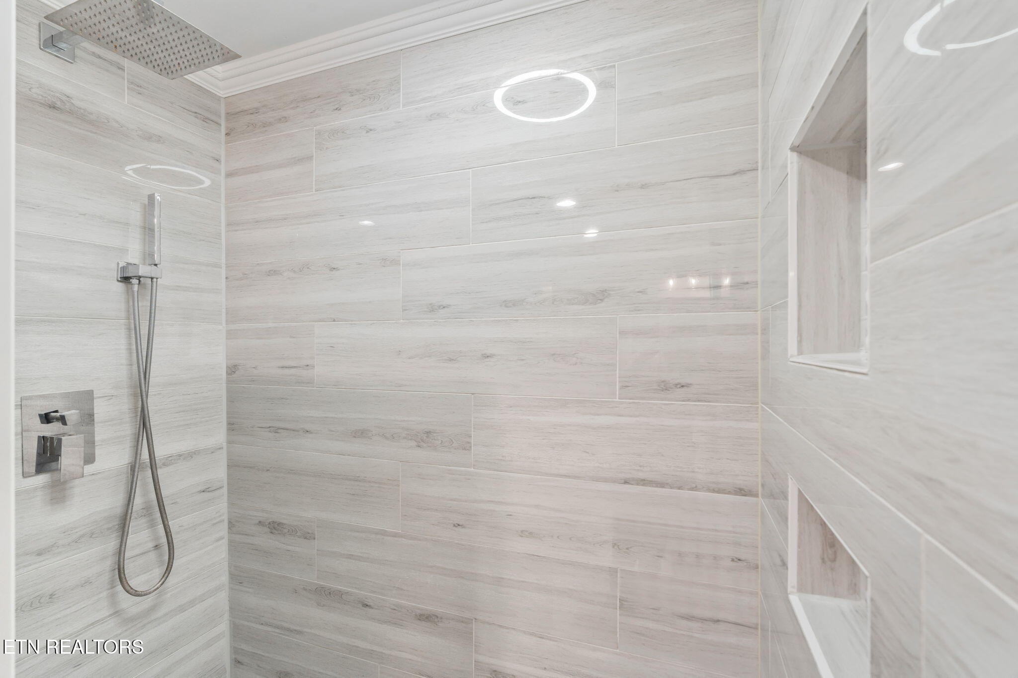 744 Butler Drive Loudon, TN 37774 - Photo 32 of 59 a bathroom with a glass shower door