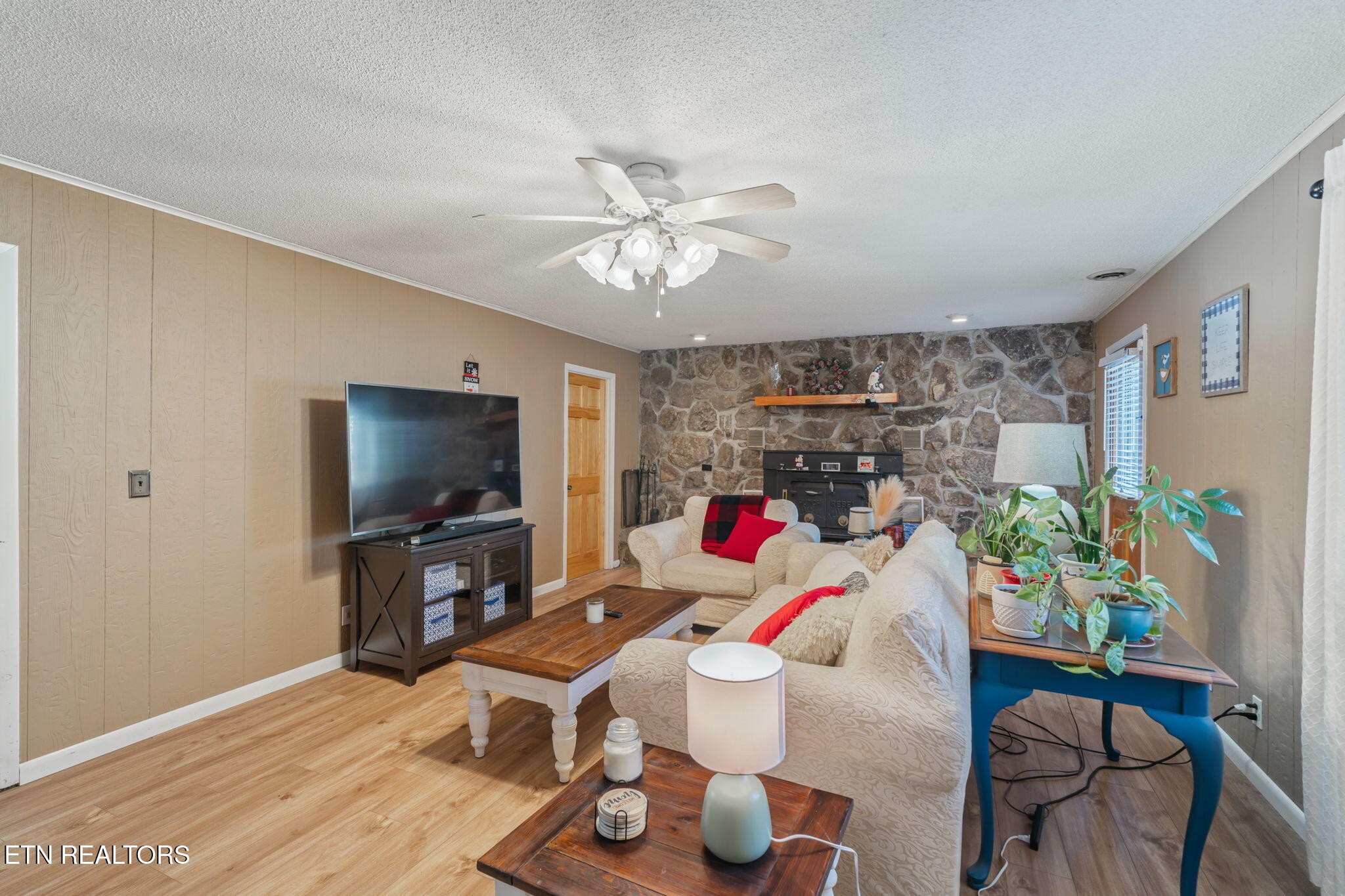 744 Butler Drive Loudon, TN 37774 - Photo 41 of 59 a living room with furniture and a flat screen tv