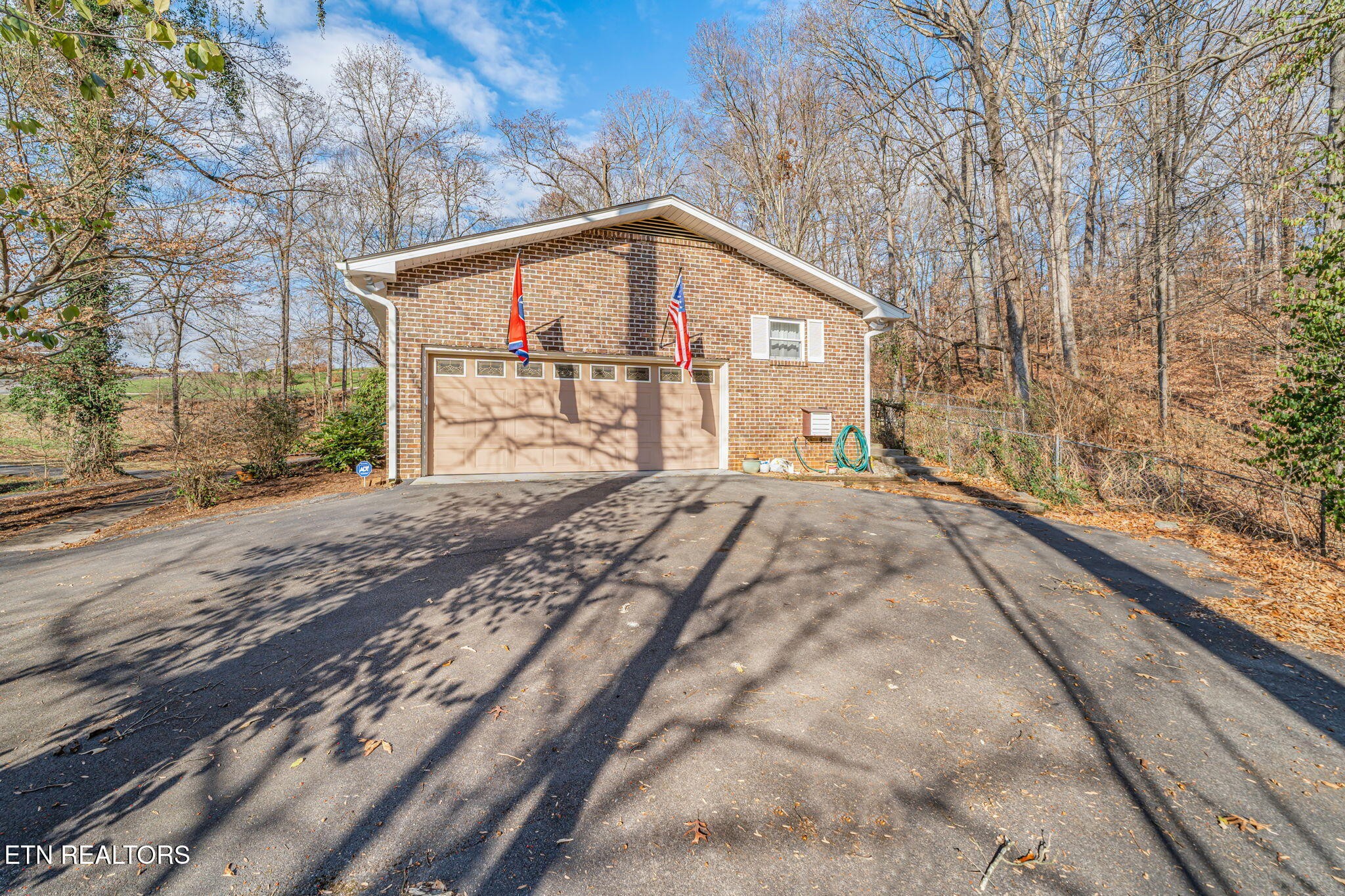 744 Butler Drive Loudon, TN 37774 - Photo 46 of 59 a view of wooden house with large trees