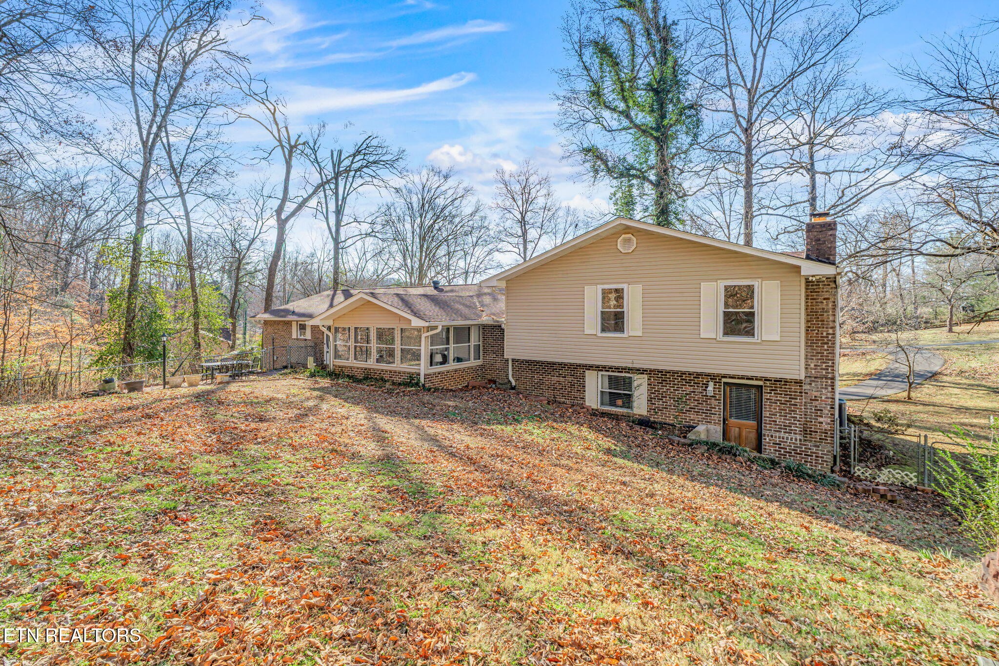 744 Butler Drive Loudon, TN 37774 - Photo 47 of 59 a front view of a house with a yard
