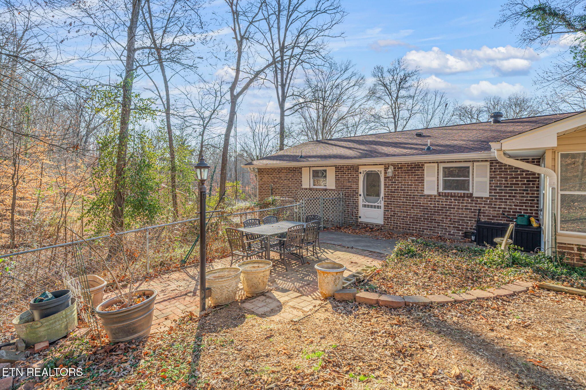 744 Butler Drive Loudon, TN 37774 - Photo 49 of 59 a view of a house with yard and sitting area