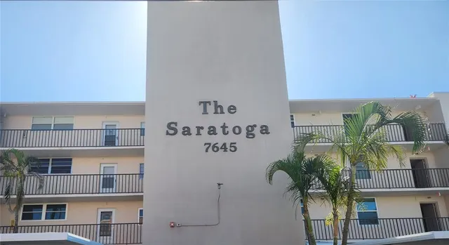 a view of balcony with potted plants