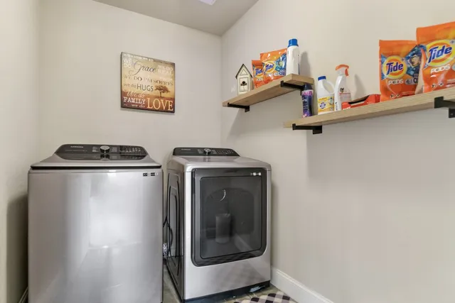 a utility room with dryer and washer