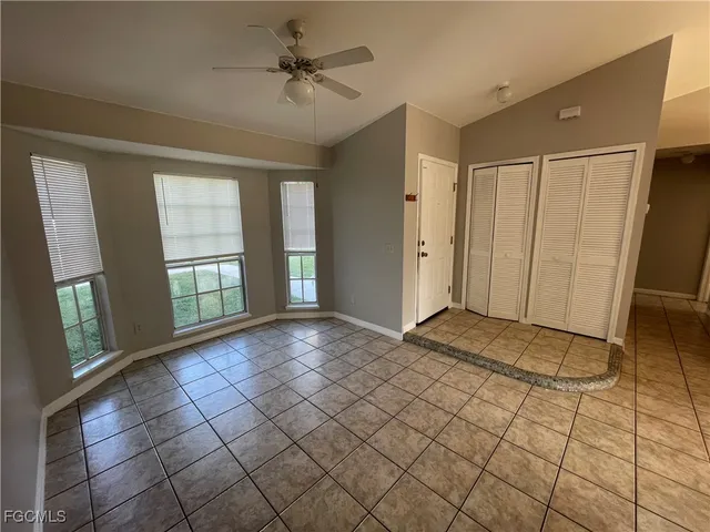a view of an empty room and window