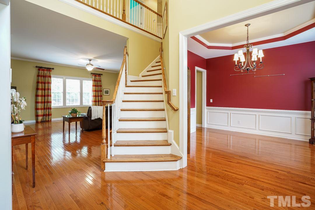 2920 Elmfield Street Raleigh, NC 27614 - Photo 3 of 30 Open views of the main floor from the entry. Hardwood floors throughout main level and on front staircase.