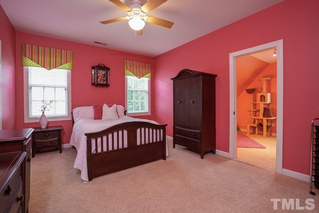 2920 Elmfield Street Raleigh, NC 27614 - Photo 23 of 30 The perfect room for your teen or tween! It features two windows, a ceiling fan, a walk-in closet and direct access to a full bathroom. The best part is the flex room off the bedroom!