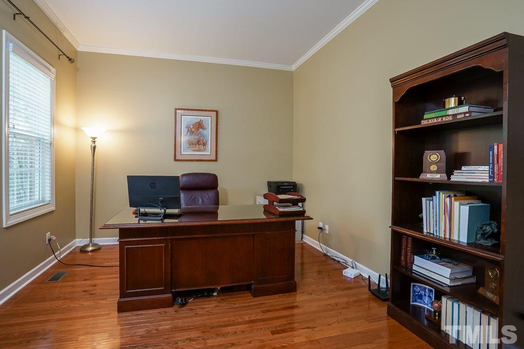 2920 Elmfield Street Raleigh, NC 27614 - Photo 5 of 30 This room off the front foyer could be an office, study, music room, formal living room... so many possibilities!