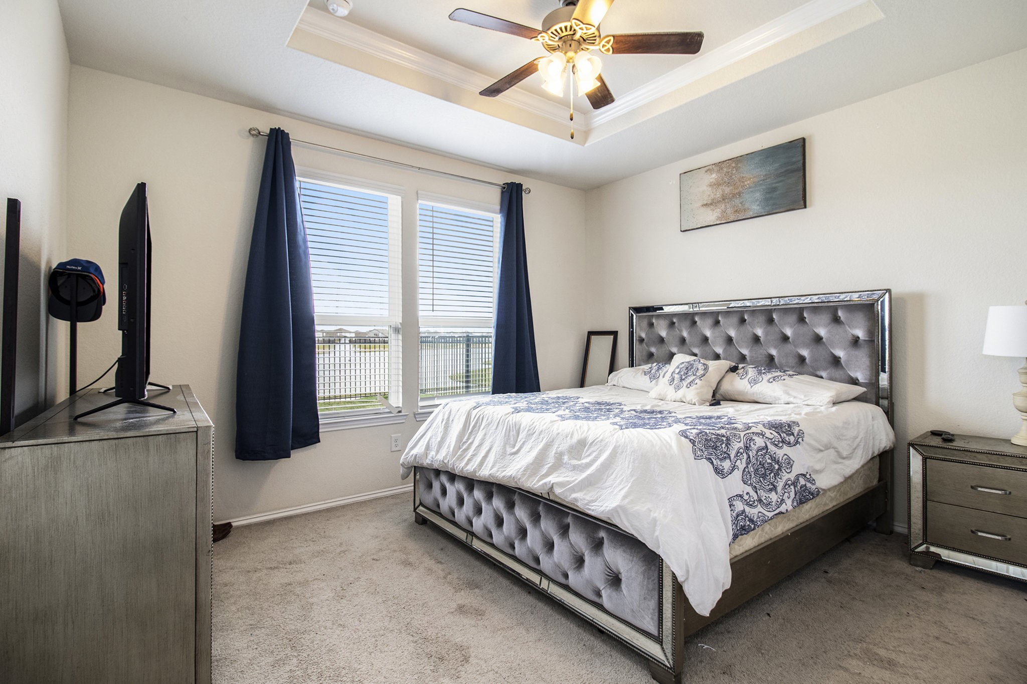 5726 Pampus Prairie Road Katy, TX 77493 - Photo 15 of 28 a bed sitting in a bedroom next to a window