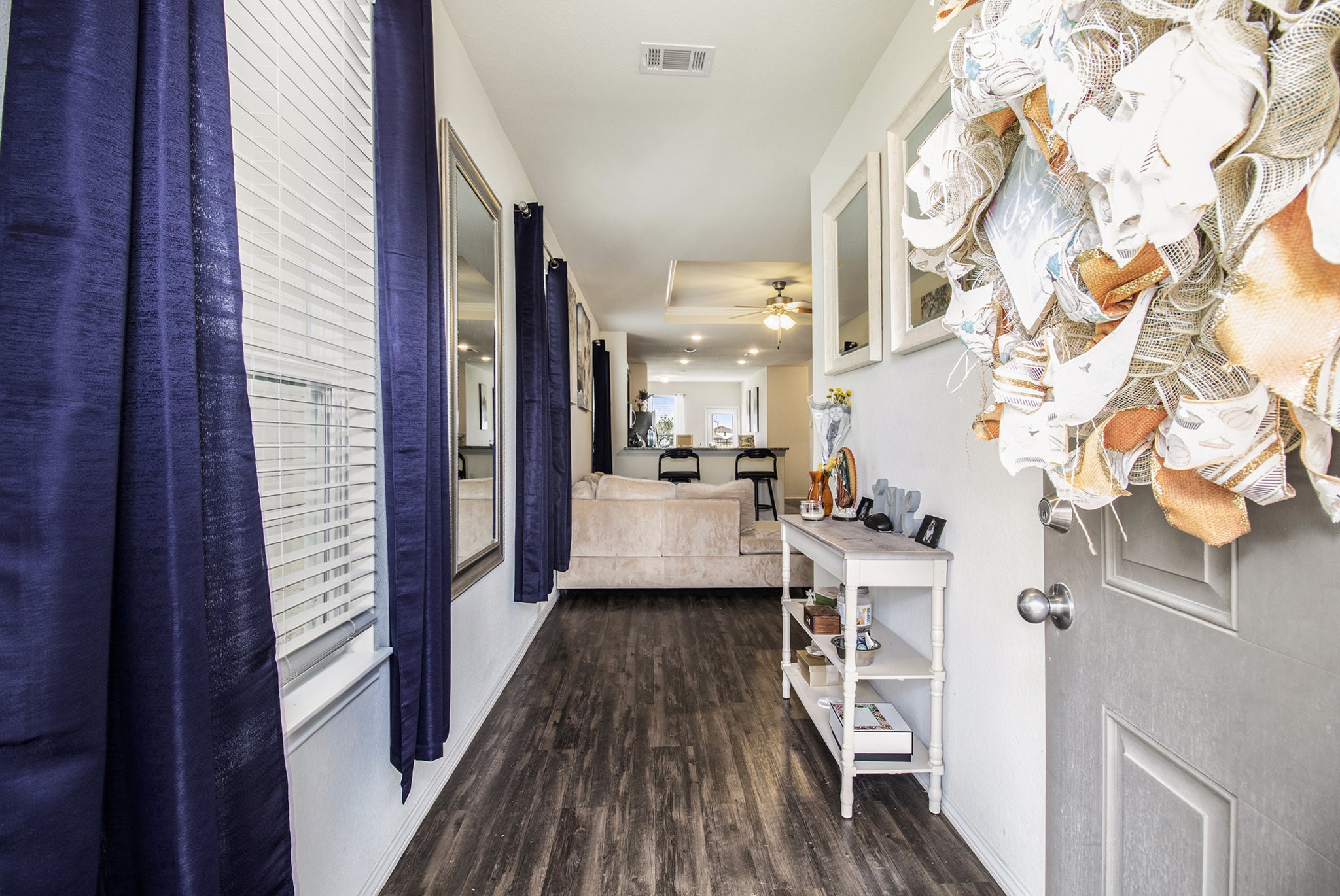 5726 Pampus Prairie Road Katy, TX 77493 - Photo 4 of 28 a view of a kitchen from the hallway