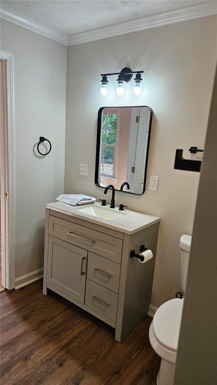 471 Perkins Circle Canton, GA 30115 - Photo 7 of 20 a bathroom with a toilet a sink and mirror