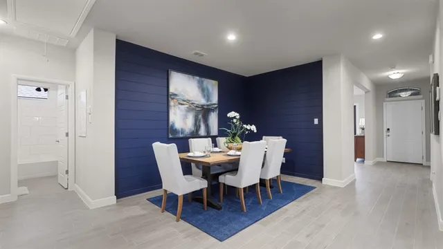 a view of a dining room with furniture