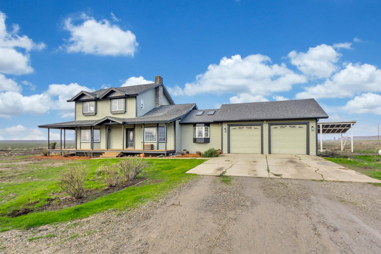 44643 County Road 29 Davis, CA 95618 - Photo 4 of 41 a view of a big house with a big yard and large trees