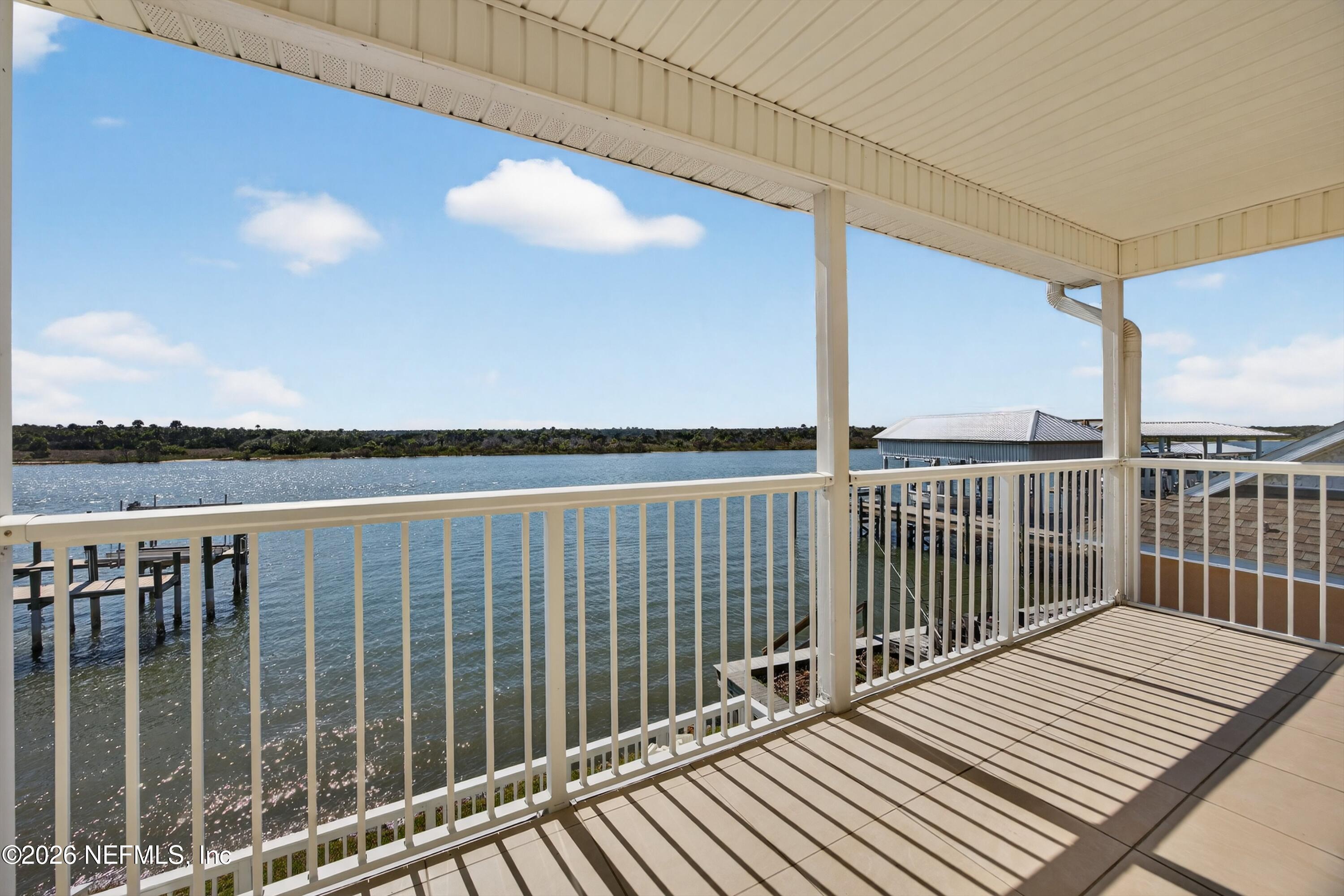 9179 June Lane St. Augustine, FL 32080 - Photo 34 of 56 a view of balcony with wooden floor