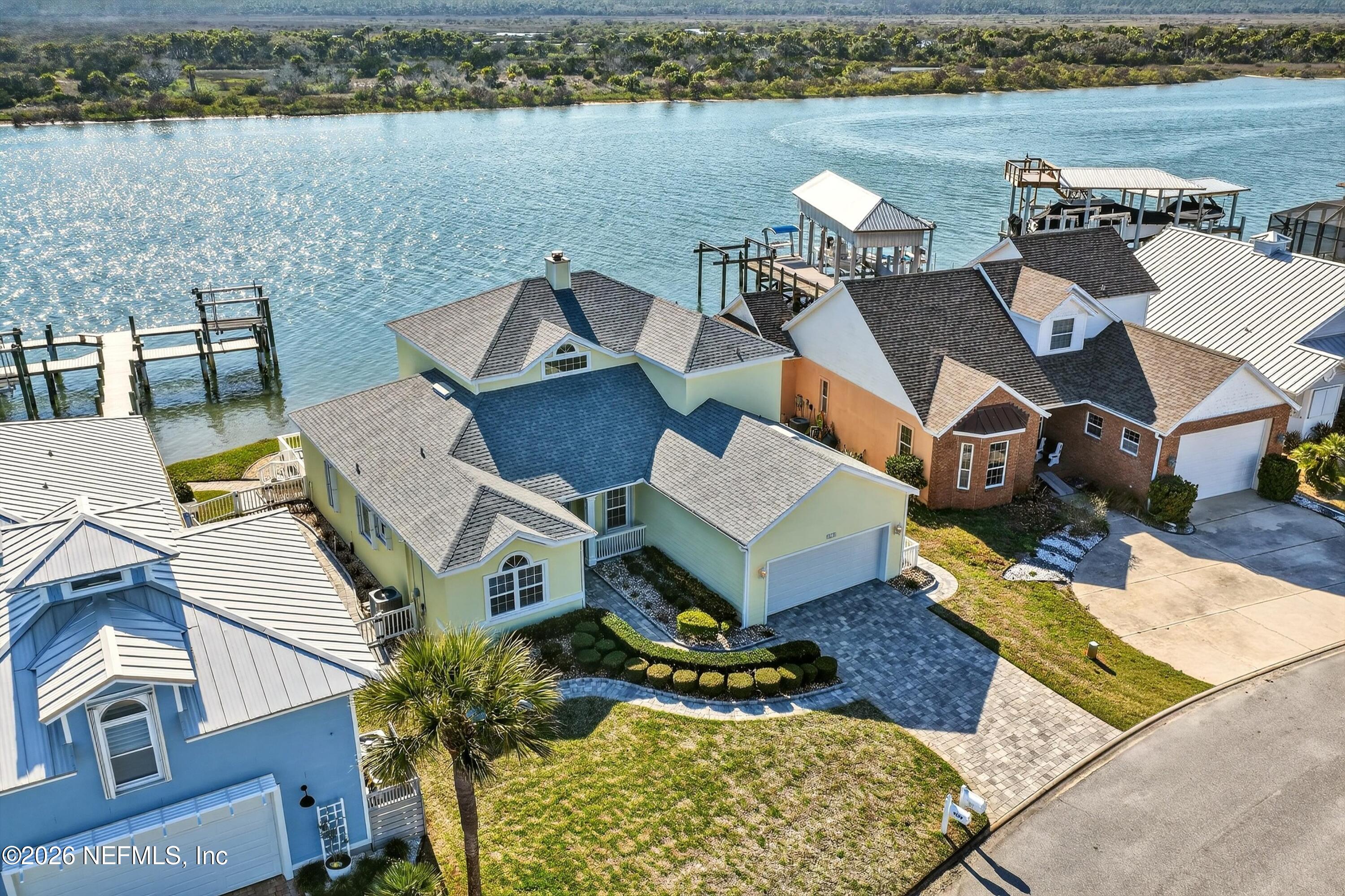 9179 June Lane St. Augustine, FL 32080 - Photo 36 of 56 an aerial view of a house with lake view