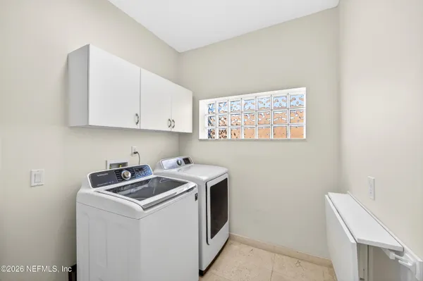 a workspace with furniture and window